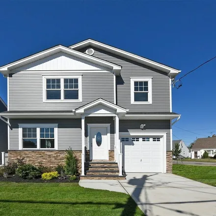 Buy this 4 bed house on 225 Munro Boulevard in Village of Valley Stream, NY 11581
