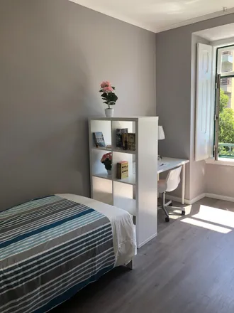 Rent this 8 bed room on Avenida Luís Bívar 7 in 1050-228 Lisbon, Portugal