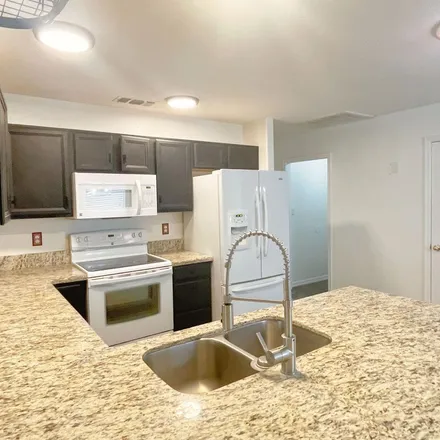 Rent this 3 bed apartment on 14570 North 90th Drive in Peoria, AZ 85381