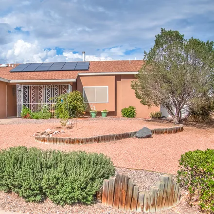Buy this 4 bed house on 365 Pyrite Drive Northeast in Rio Rancho, NM 87124