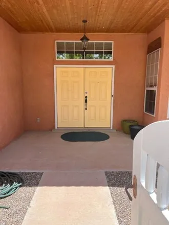 Rent this 4 bed house on 6908 Albany Hills Drive Northeast in Rio Rancho, NM 87144