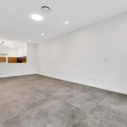 Rent this 4 bed duplex on Kiernan Crescent in Abbotsbury NSW 2176, Australia