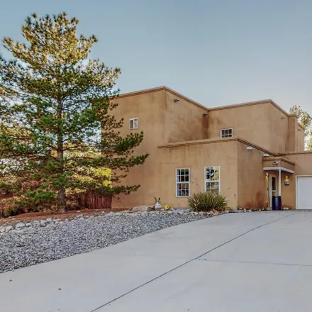 Buy this 4 bed house on 209 Montana Wells Road Northeast in Rio Rancho, NM 87124