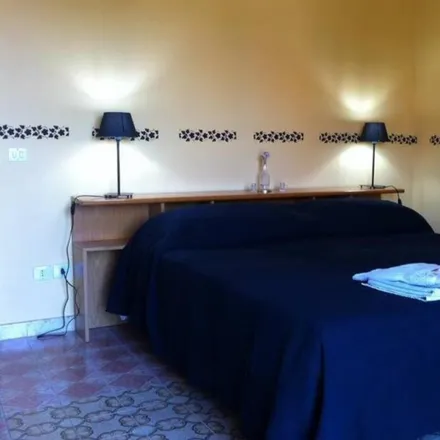 Rent this 4 bed room on Via Francesco Marucelli in 00168 Rome RM, Italy