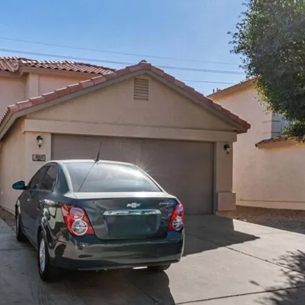 Buy this 4 bed house on 885 East Mayfield Circle in San Tan Valley, AZ 85143