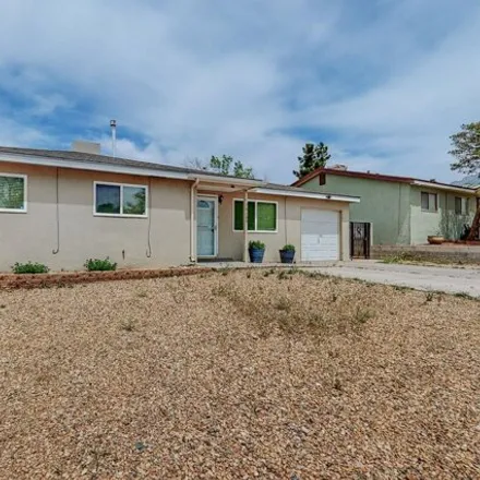 Buy this 3 bed house on 14127 Domingo Road Northeast in Eastrange-Piedra Vista, Albuquerque