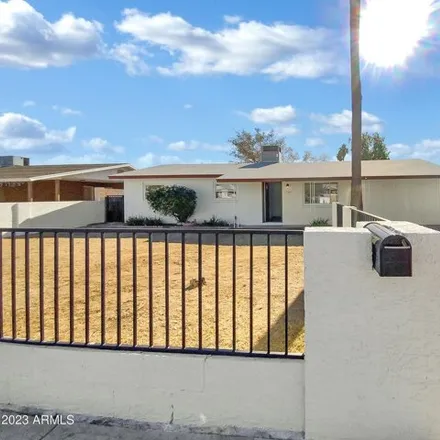 Buy this 3 bed house on 7453 East Capri Avenue in Mesa, AZ 85208