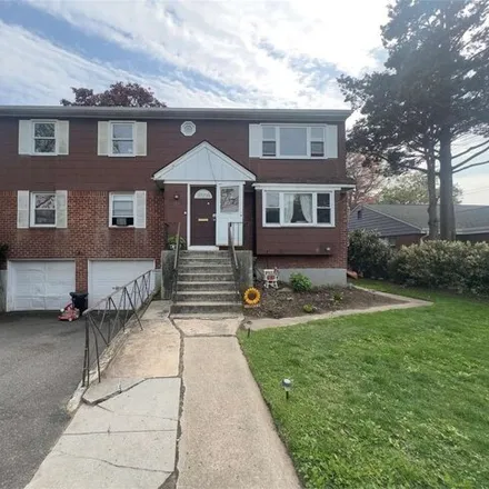 Rent this 3 bed house on 184 Charing Cross Road in Village of Lynbrook, NY 11563