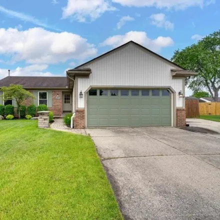 Buy this 3 bed house on 16300 Sudbury Court in Macomb Township, MI 48044