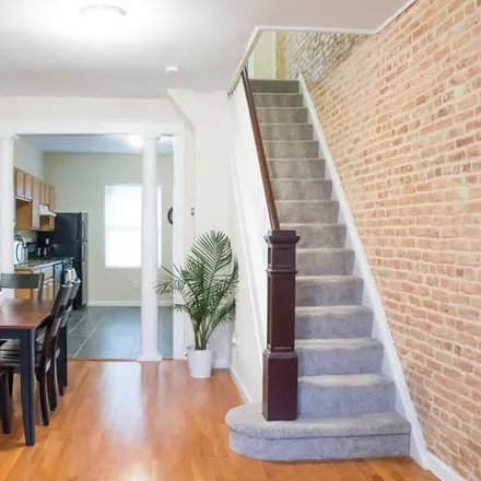 Rent this 4 bed townhouse on 210 N Kenwood Ave