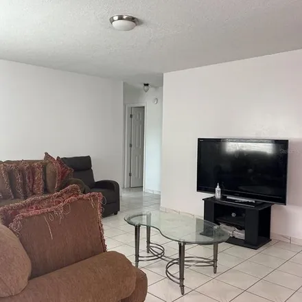 Rent this 4 bed apartment on 7637 Ceres Drive in Orange County, FL 32822