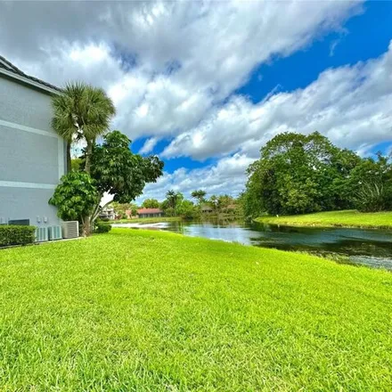 Rent this 2 bed condo on 11237 Eagle Nest Drive in Coral Springs, FL 33071