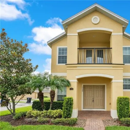 Rent this 4 bed townhouse on 1127 Honey Blossom Drive in Orange County, FL 32824