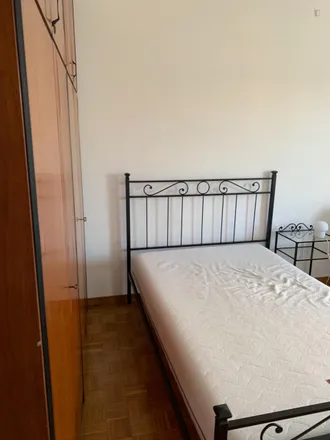 Rent this 4 bed room on Via Salvatore di Giacomo in 00142 Rome RM, Italy