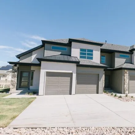 Buy this 5 bed townhouse on North Harvest Village Lane in Saratoga Springs, UT 84043