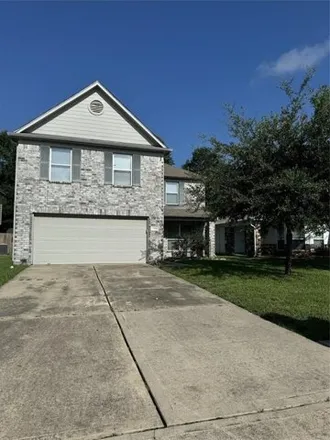Buy this 4 bed house on 16886 Blackberry Lily Ln in Conroe, Texas