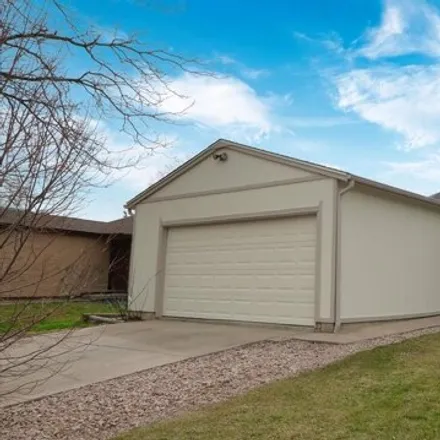 Buy this 4 bed house on 1661 Dunkirk Court in Aurora, CO 80011