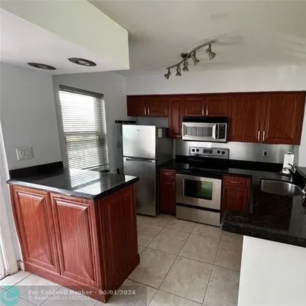 Image 3 - 2175 South Cypress Bend Drive, Pompano Beach, FL 33069, USA - Condo for sale