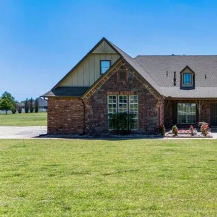 Buy this 4 bed house on 15012 E 115th St N in Owasso, Oklahoma