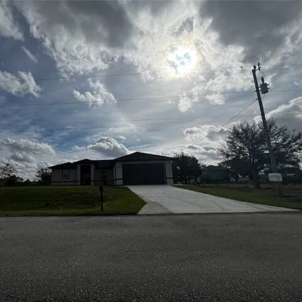 Buy this 3 bed house on 3347 5th Street Southwest in Lehigh Acres, FL 33976