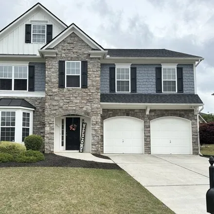 Buy this 4 bed house on 838 Key Largo Point Northeast in Gwinnett County, GA 30011