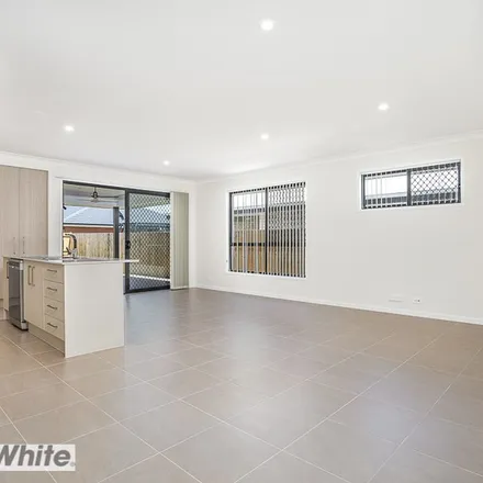 Rent this 4 bed apartment on 25 Gibson Street in Mango Hill QLD 4509, Australia