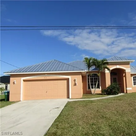 Rent this 3 bed house on 3645 Northwest 15th Street in Cape Coral, FL 33993