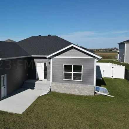 Buy this 4 bed house on 3059 Prairie Farms Circle South in Fargo, ND 58104