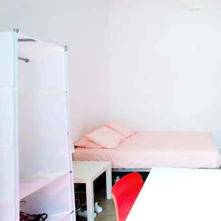 Rent this 5 bed room on Churrasqueira do Areeiro in Rua Vitor Hugo, 1000-294 Lisbon