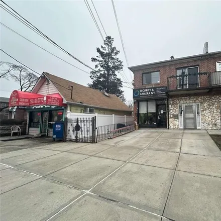 Buy this 4 bed house on 75-11 164th Street in New York, NY 11366