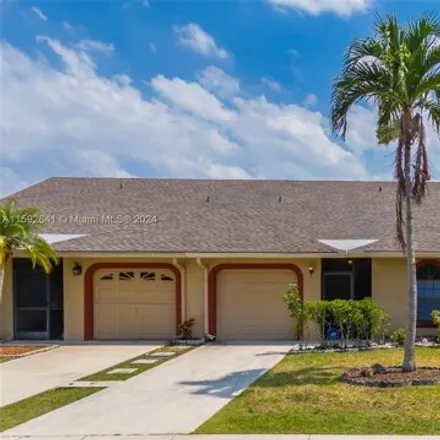 Buy this 3 bed house on 9700 Northwest 76th Court in Tamarac, FL 33321