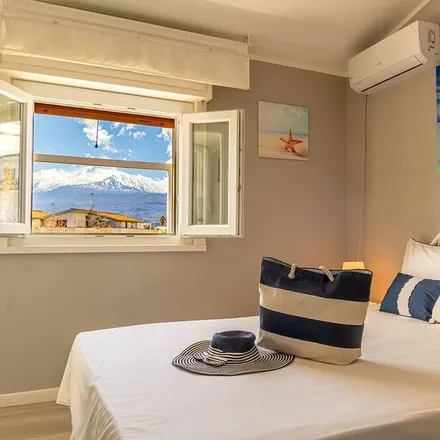 Rent this 1 bed apartment on Giardini Naxos in Via Bruderi, 98039 Taormina ME