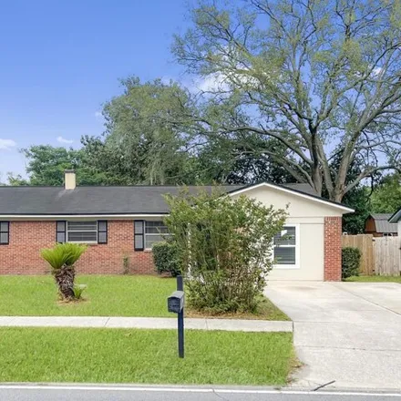 Buy this 4 bed house on 6019 Ricker Road in Enchanted Park, Jacksonville