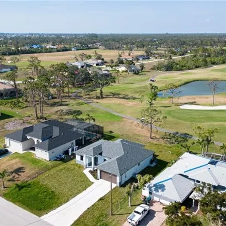 Buy this 3 bed house on Coral Oaks Golf Course in 1800 Northwest 28th Avenue, Cape Coral