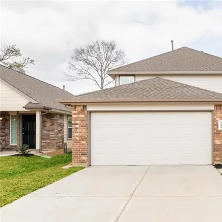 Rent this 4 bed house on 3293 Chunk Dr in Conroe, Texas