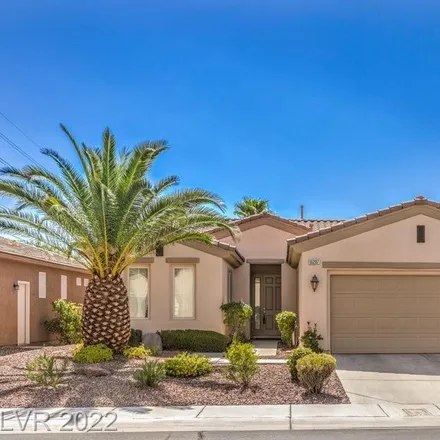 Buy this 2 bed house on 5199 Silenzio Street in Summerlin South, NV 89135