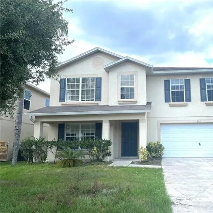 Rent this 4 bed house on 255 Windrose Drive in Orange County, FL 32824