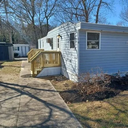 Buy this studio apartment on 658 Sound Avenue in Wading River, NY 11933