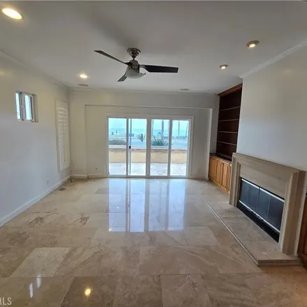 Rent this 4 bed apartment on 2212 Pacific Coast Highway in Huntington Beach, CA 92648