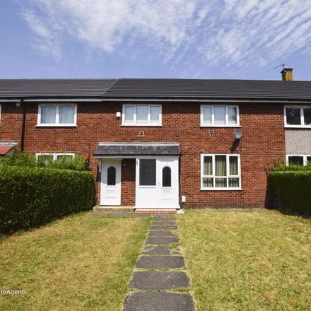 Rent this 3 bed townhouse on Firethorn Walk in Urmston, M33 5NY