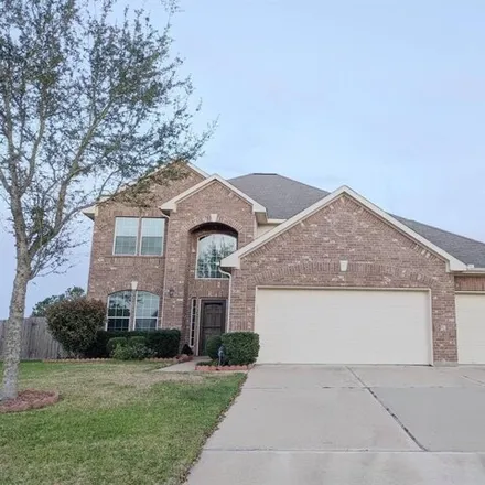Rent this 4 bed house on 123 Sandstone Bend Lane in League City, TX 77539