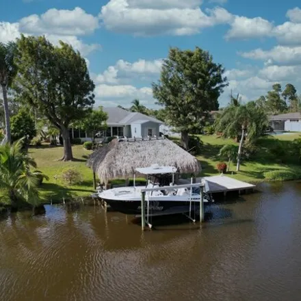 Buy this 2 bed house on 727 Southeast Calmoso Drive in Port Saint Lucie, FL 34983