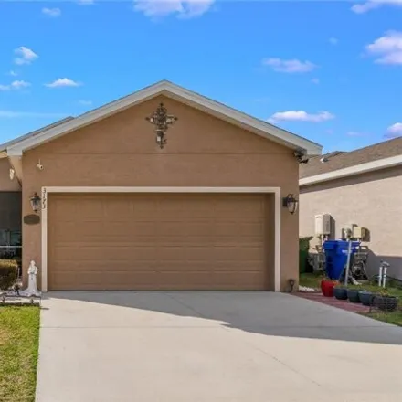 Buy this 3 bed house on 3149 Whispering Trails Avenue in Winter Haven, FL 33884