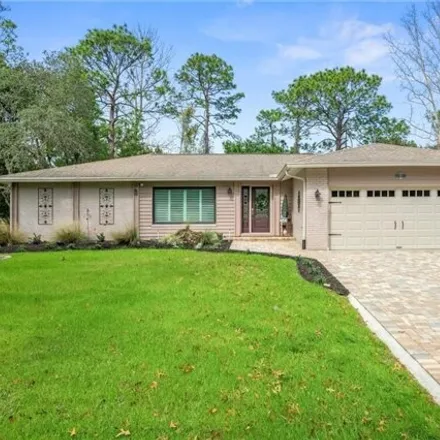 Buy this 3 bed house on 82 Shumard Court North in Citrus County, FL 34446