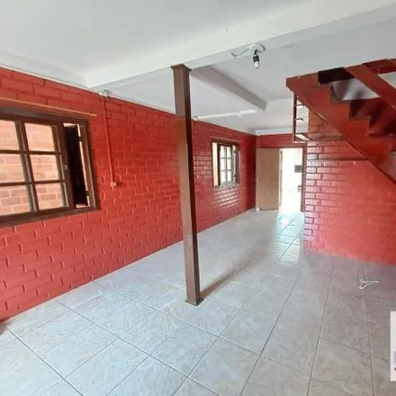 Rent this 2 bed house on Rua Max Breuel in Ponta Grossa, Porto Alegre - RS