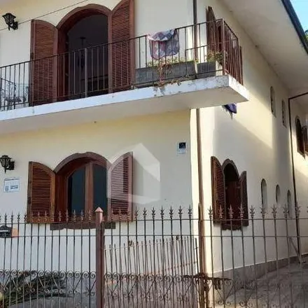 Buy this 4 bed house on Rua Eduardo Vasconcelos Pederneiras in Vila Cruz, Poços de Caldas - MG