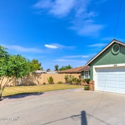 Rent this 3 bed house on 504 East 9th Avenue in Mesa, AZ 85204