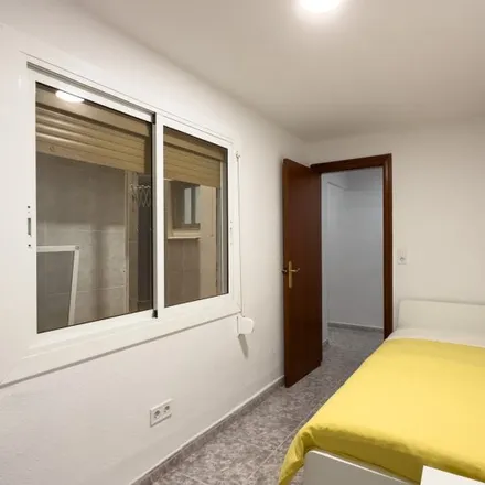 Rent this 3 bed room on Garden House Hostel Barcelona in Carrer d'Hedilla, 08001 Barcelona