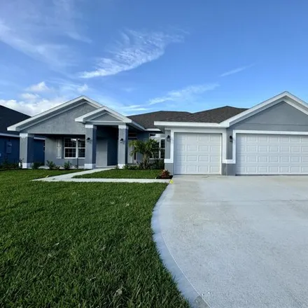 Buy this 4 bed house on Waterstone Boulevard in Lakewood Park, FL 34951