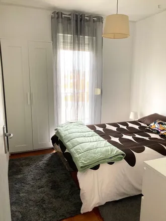 Rent this 4 bed room on Rua Cidade de Malange 2 in Lisbon, Portugal